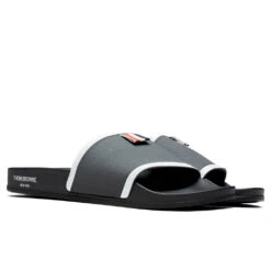 Rubber Pool Slide - Dark Grey -Best Shoes Shop Thom Browne Rubber Pool Slide Dark Grey MFL054A 05690 025 08 30 22 Feature JORDAN 2